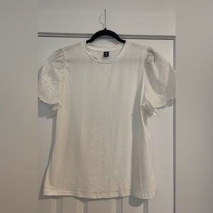 White blouse with ruffle sleeves